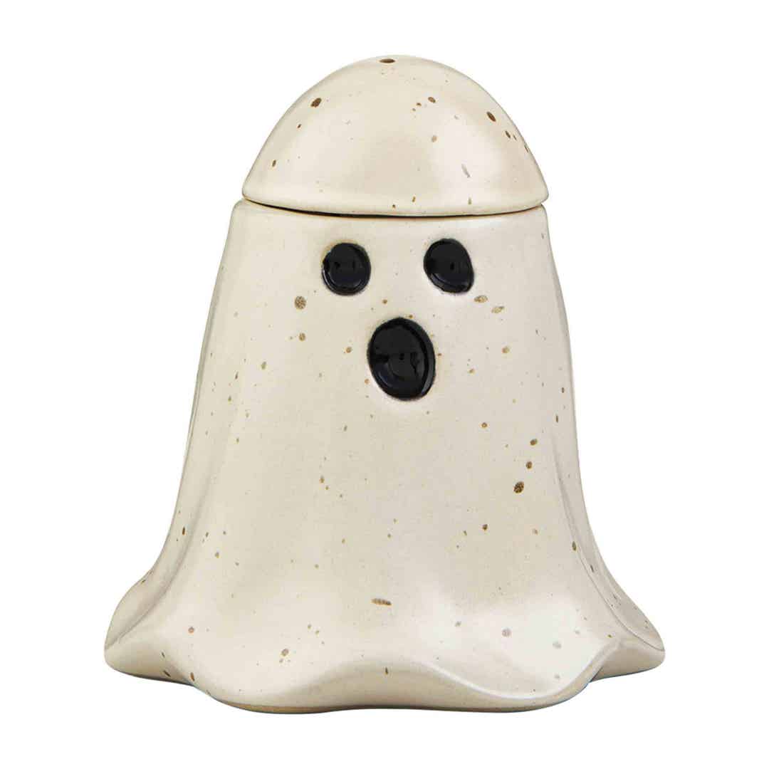 Stoneware Halloween candy canister with black jack-o'-lantern face on white background.