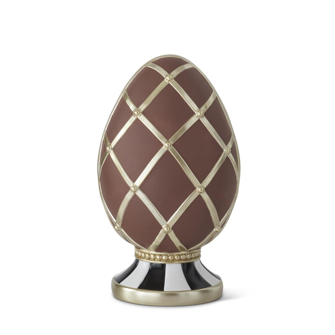 Twenty-one inch chocolate resin Easter egg with gold accents