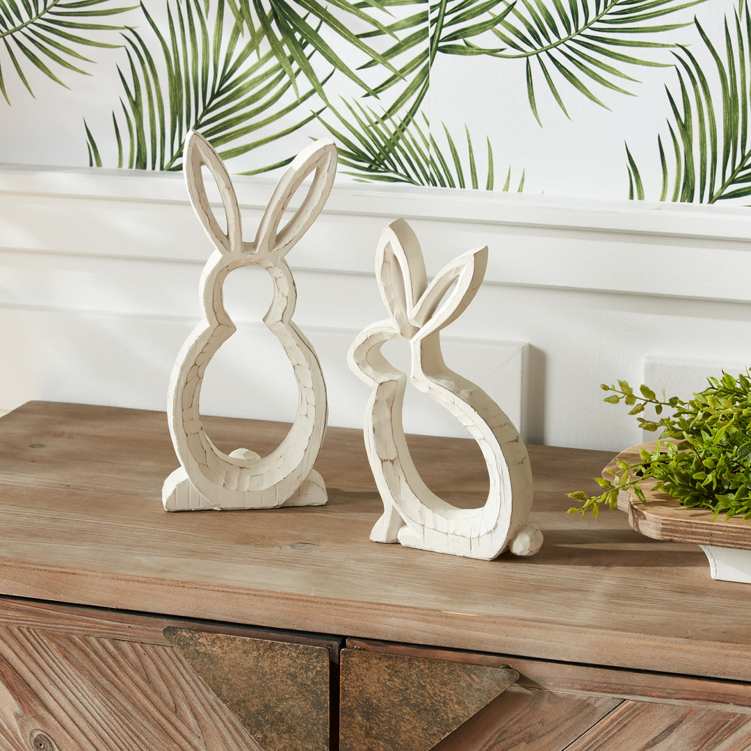 White bunny outline resin figurine with a simple silhouette ideal for seasonal centerpieces.