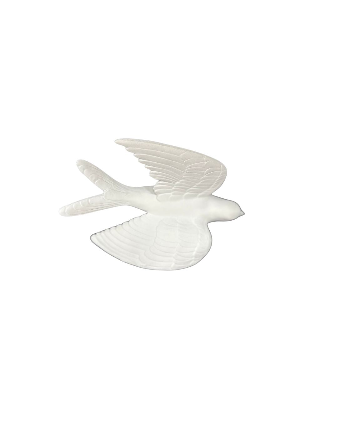 Matte white resin wall hanging featuring a minimalist bird silhouette with smooth texture.