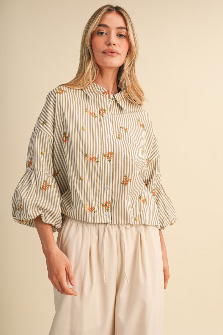 Aya striped floral embroidery button down top with 3/4 bubble sleeves and a collared neckline.