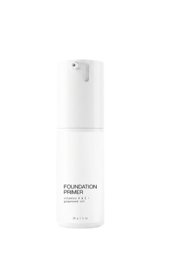White bottle of Foundation Primer with Vitamins A & E and grapeseed oil.