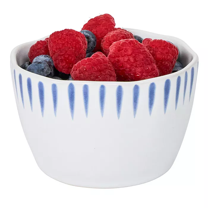 Sitio Stripe Ramekin in Delft Blue filled with fresh raspberries and blueberries.
