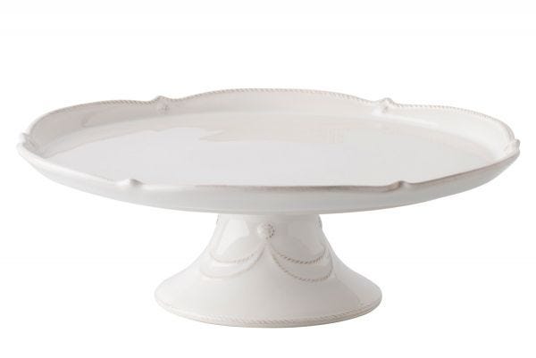 Berry & Thread Whitewash ceramic cake stand with scalloped edges and decorative garland details.
