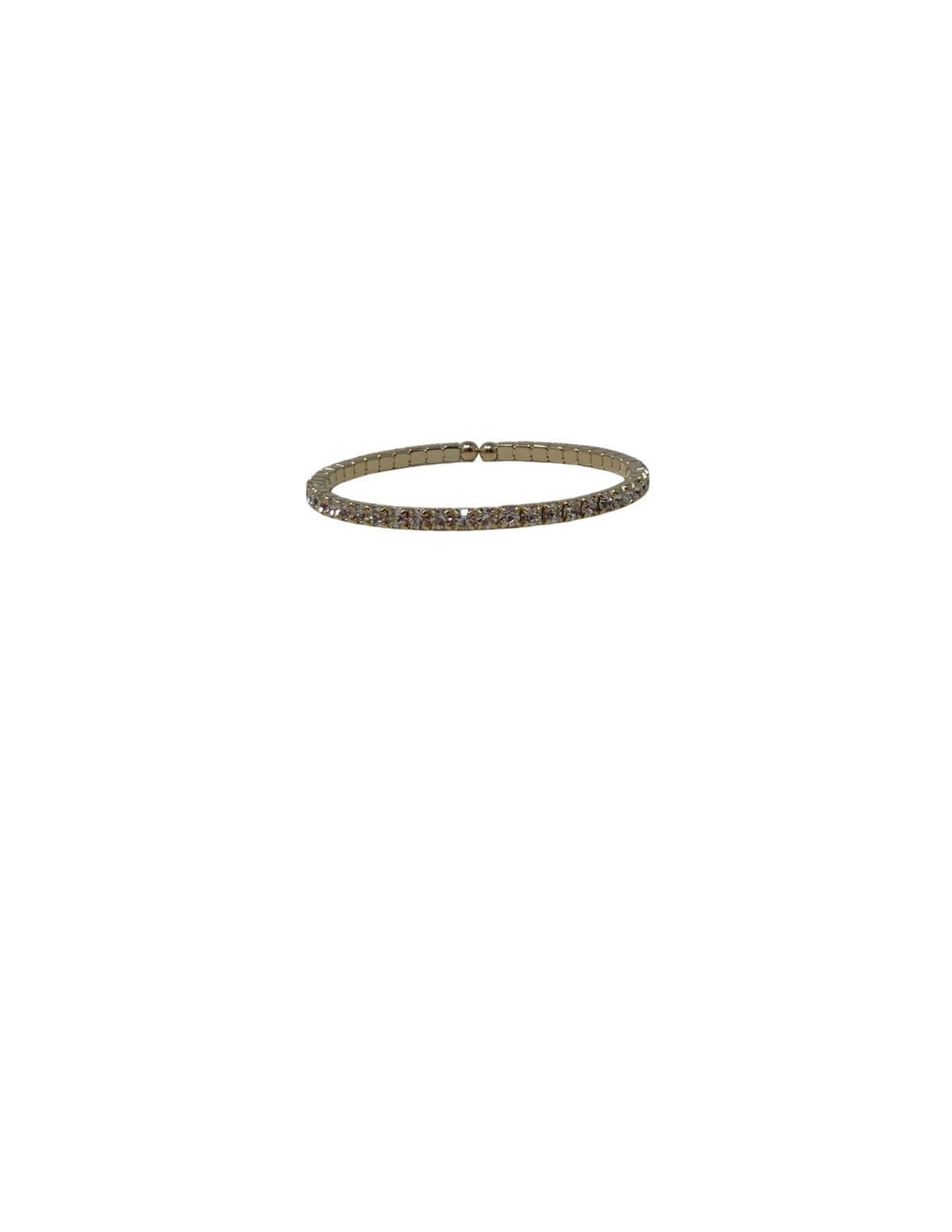 Single row crystal stretch cuff bracelet in a gold-tone setting against a white background.