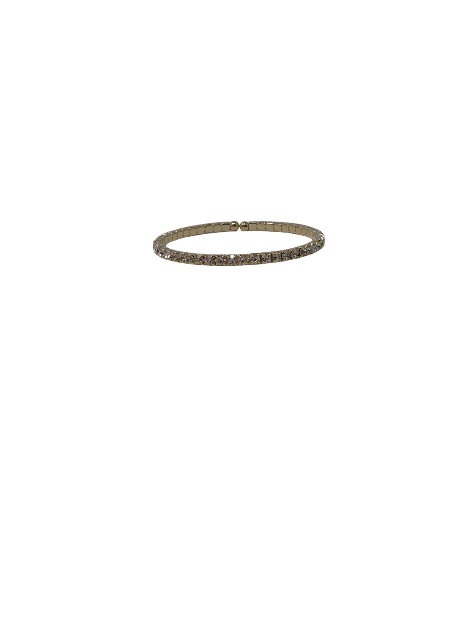Single row crystal stretch cuff bracelet in a gold-tone setting against a white background.