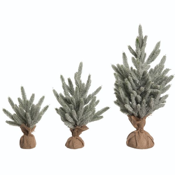 Plastic bag containing artificial floral trees with green foliage.