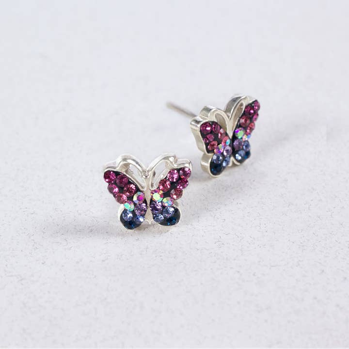 Sterling silver butterfly stud earrings featuring Austrian crystals in a delicate wing pattern.
