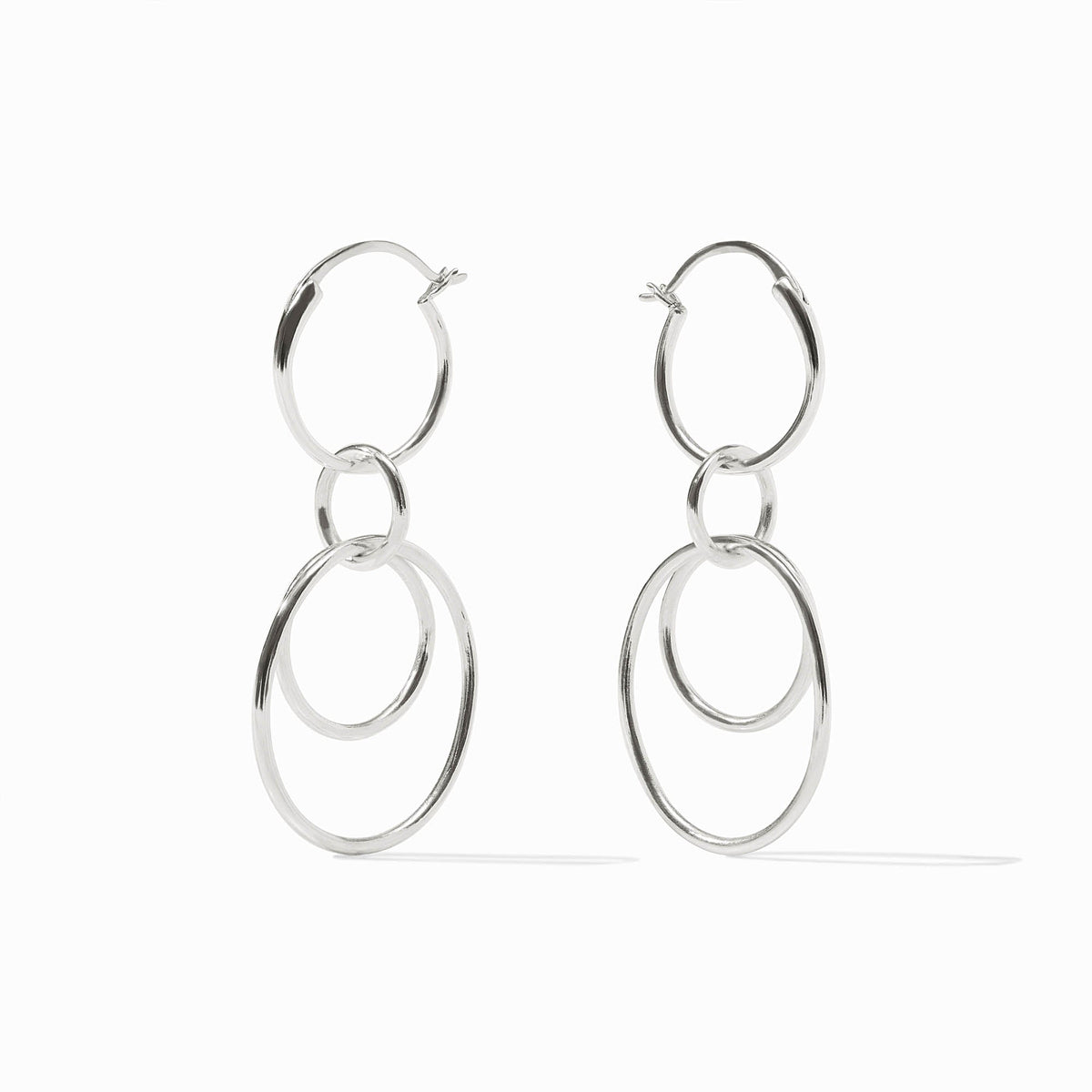 Pair of silver Simone 3-in-1 earrings featuring three interlocking hoops of varying sizes.