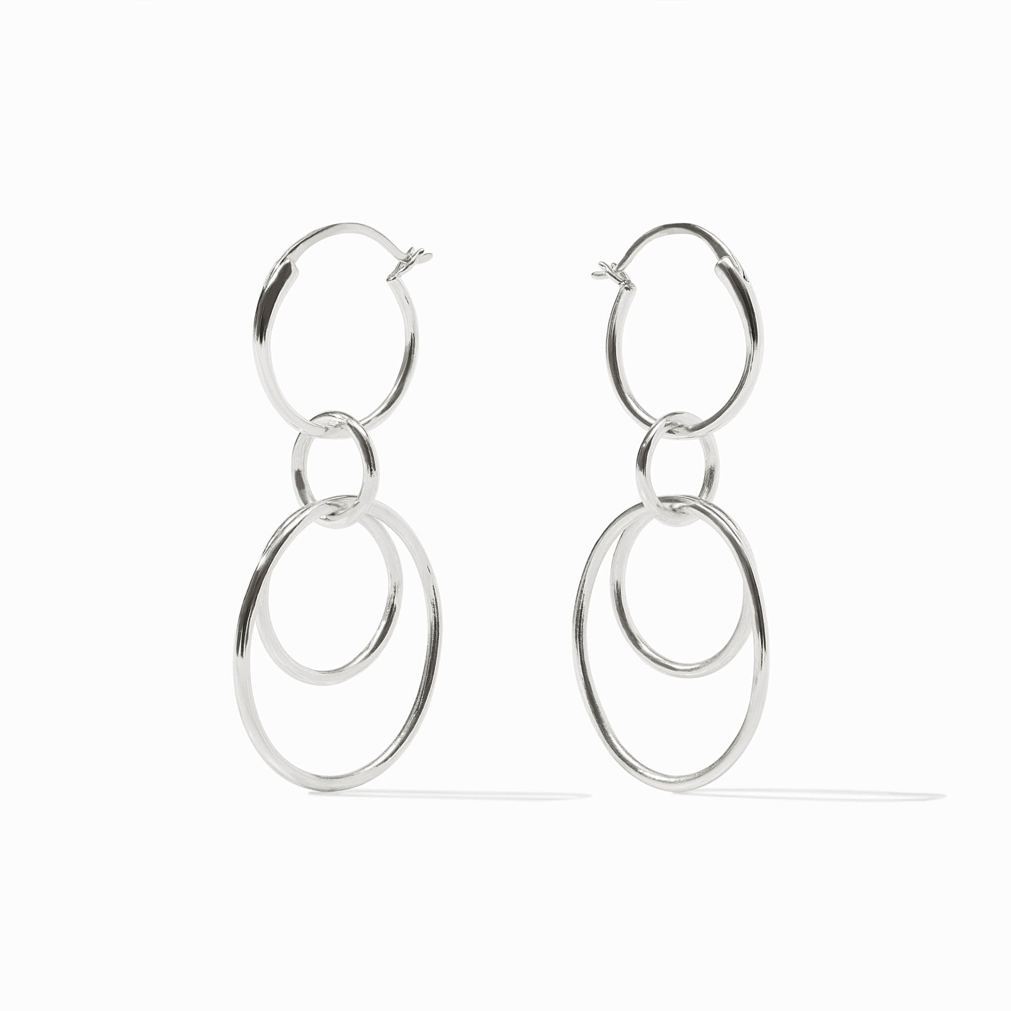Pair of silver Simone 3-in-1 earrings featuring three interlocking hoops of varying sizes.