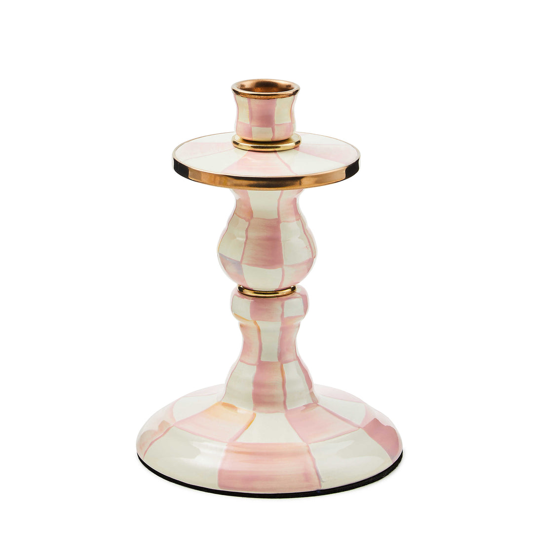 Hand-painted pink and white checkered candlestick with brass accents and a bronzed rim.