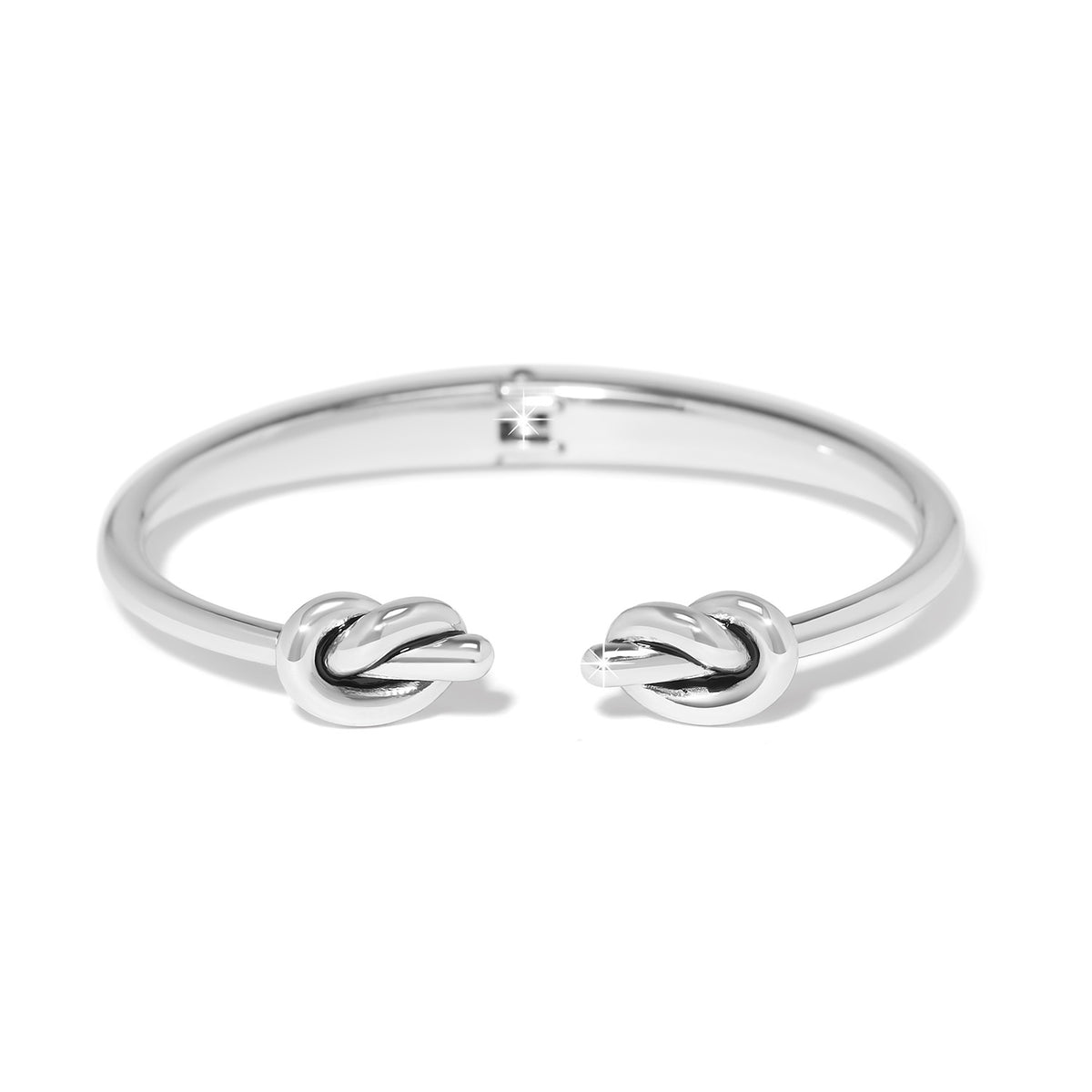 Silver plated hinged bangle bracelet with a single knot open hinge closure.