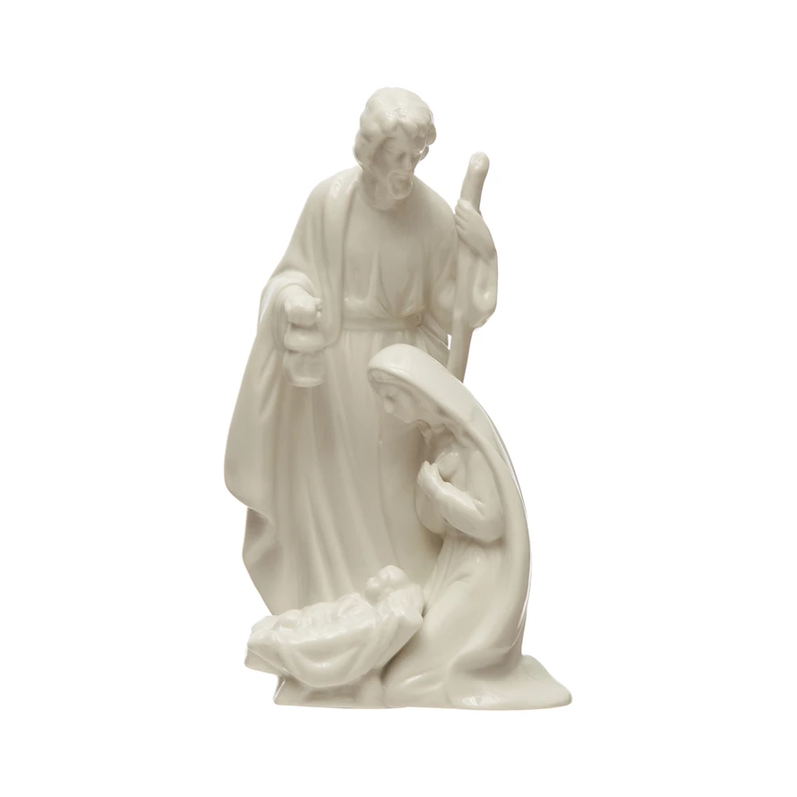 White stoneware Holy Family figurine with a classic religious silhouette.