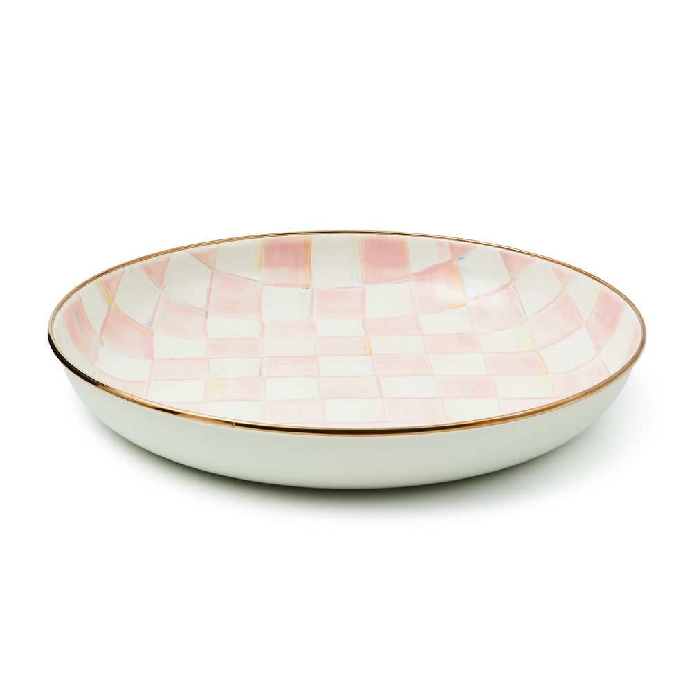 Hand-glazed steel bowl with rosy checkered pattern on a bronzed stainless rim.