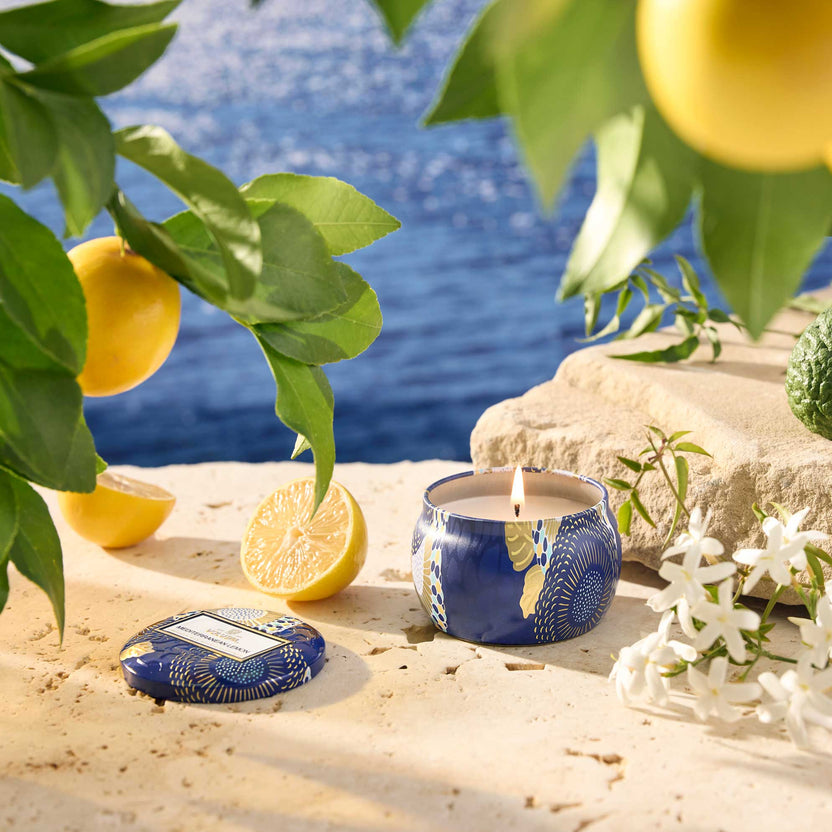 Mediterranean Lemon Mini Tin candle in a small rectangular tin with a smooth white wax surface and natural wick.