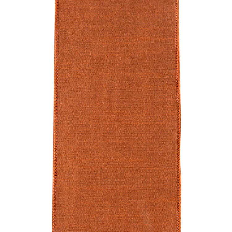 Close-up of 4-inch wide copper velvet filigree ribbon with wired edges and a textured finish.