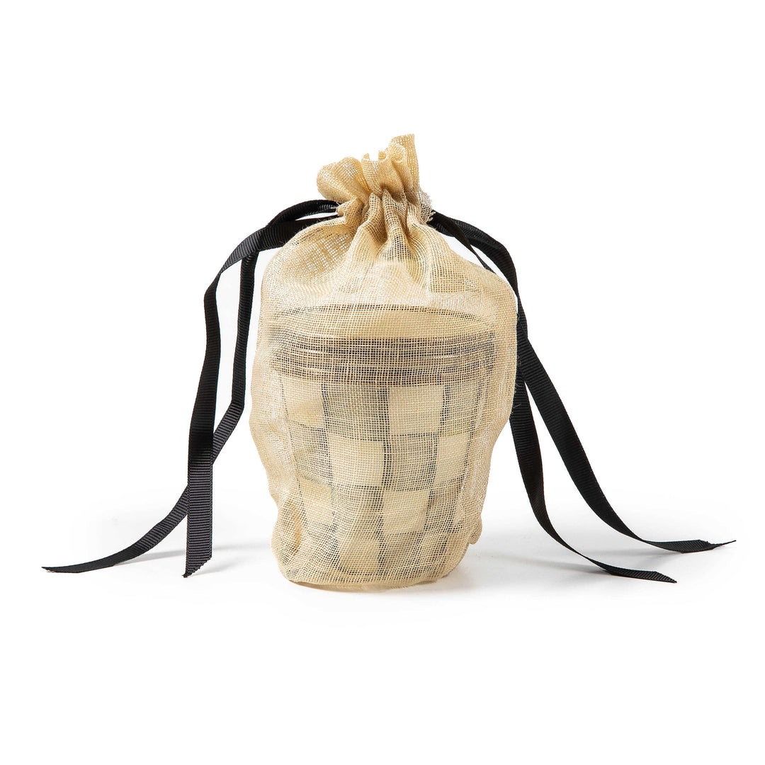 Sterling Check Enamel Herb Pot inside a gold mesh drawstring gift bag with black ribbons.