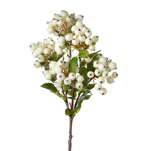 Snowy white berry bush with foam foliage on a metal stand