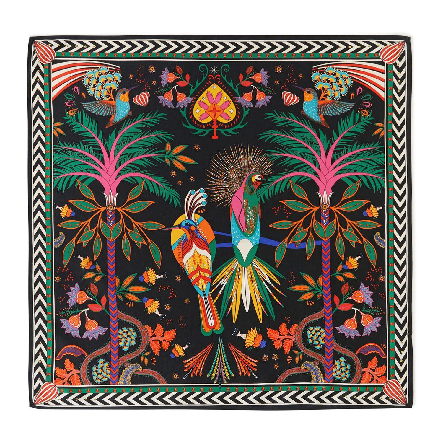 Mini square scarf with a vibrant tropical bird and palm tree illustration on a black background.