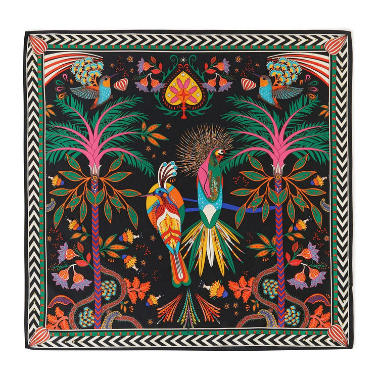 Mini square scarf with a vibrant tropical bird and palm tree illustration on a black background.