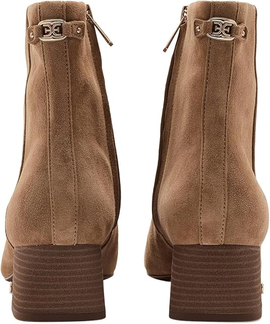Rear view of Paige Saigon Shpsuede ankle boots in tan suede with block heels and metal logo detail.