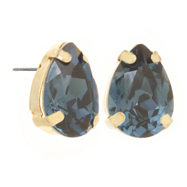 Silver-tone stud earrings featuring a small luminous gemstone set in a sleek circular silhouette.