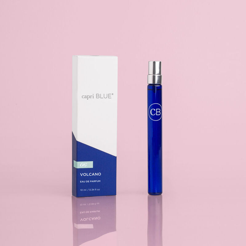 Capri Blue Volcano Eau de Parfum in a 0.34 fl oz blue glass travel spray bottle and white box.