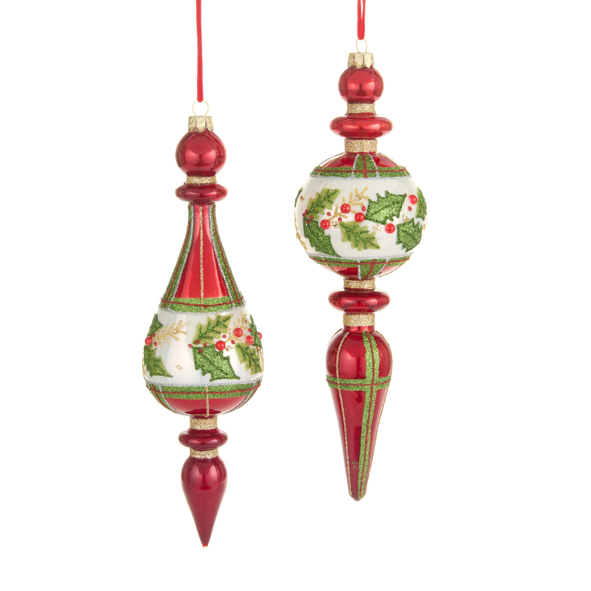 Two red and white glass drop ornaments with green plaid and holly leaf designs.