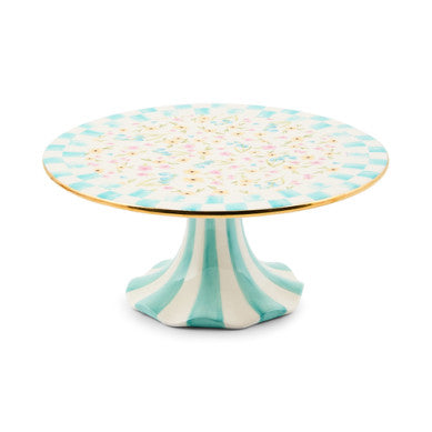 Small dolomite ceramic pedestal platter with a natural stone finish.