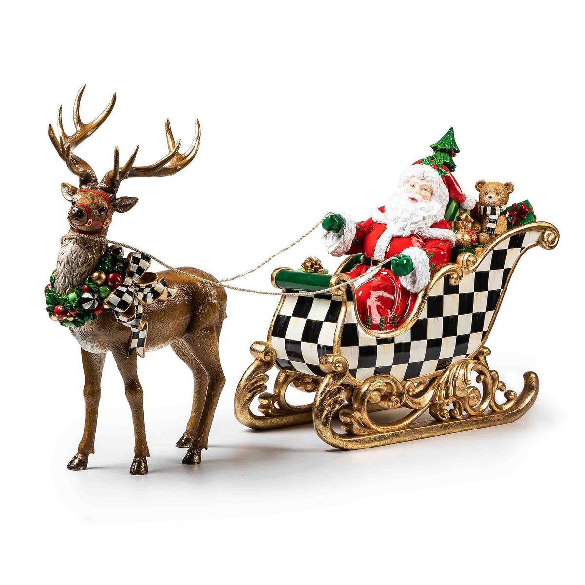 Night Before Christmas Santa and Sleigh figurine with a reindeer and checkered sleigh.