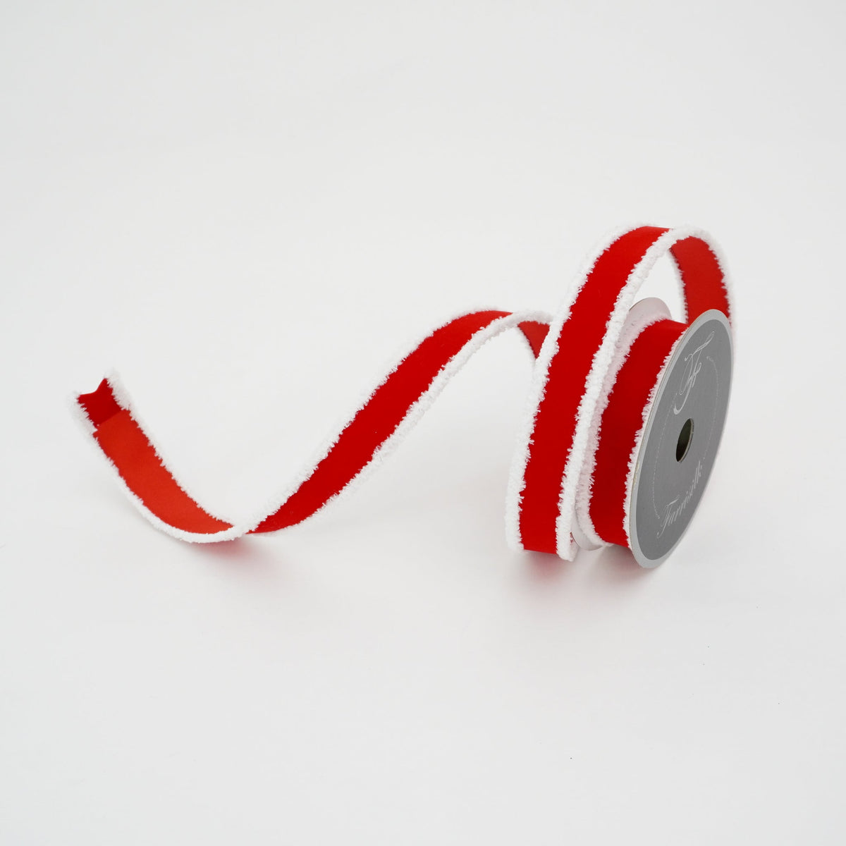 Red flocked velvet ribbon with wired edge and secondary fabric backing.