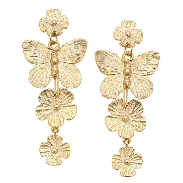 Handcast gold tiered earrings featuring a butterfly and three floral charms on each drop.