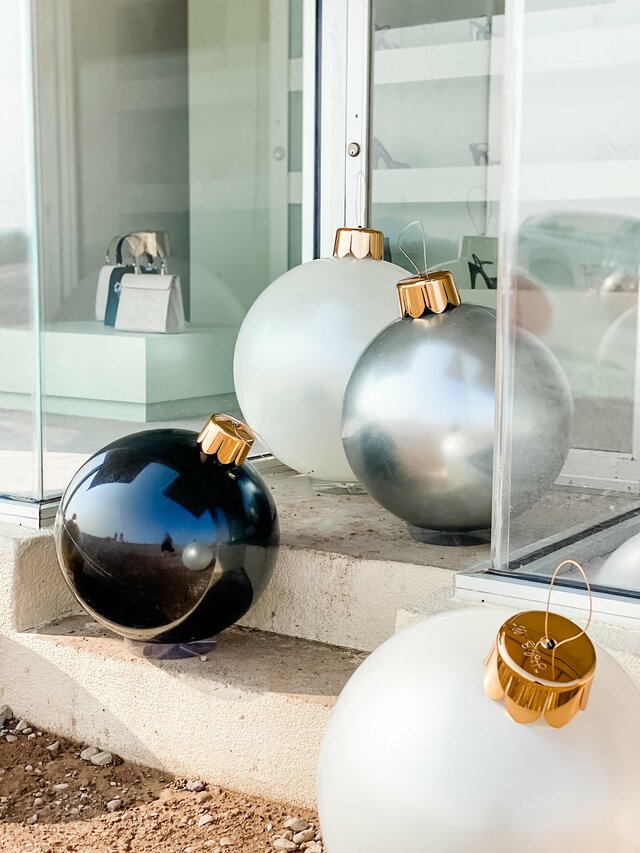 30-inch Holiball inflatable ornament in white with a red topper.
