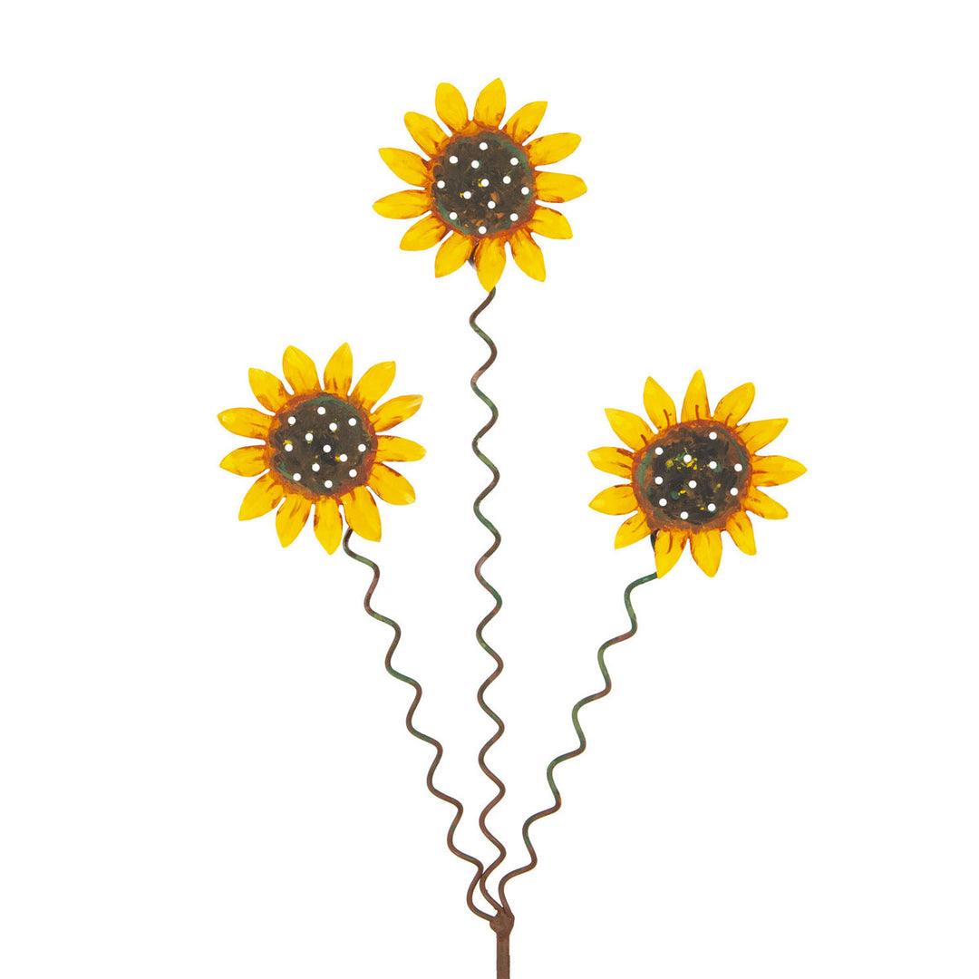 Three brown sunflower stakes with yellow petals arranged in a triangular cluster.