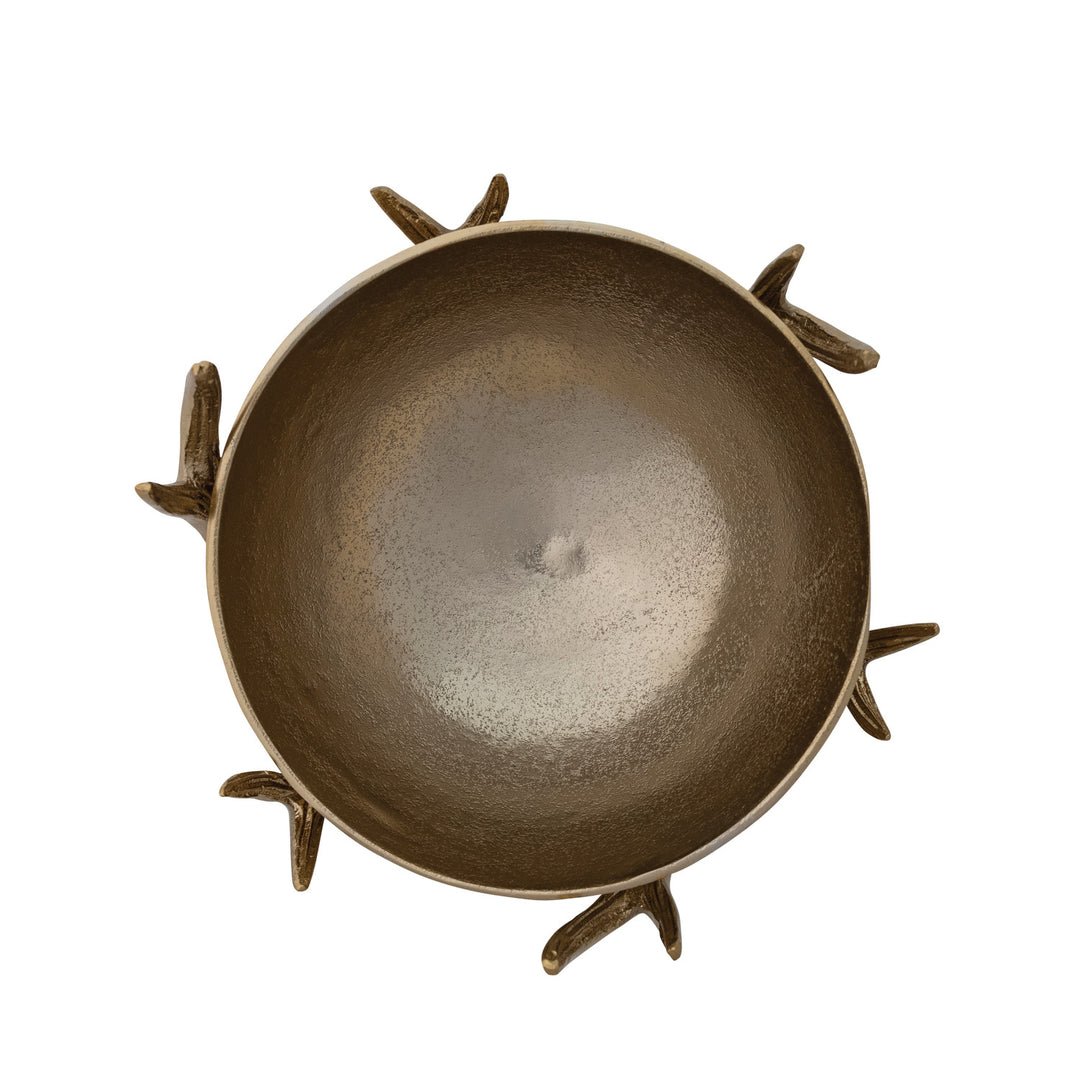 Top view of a round bronze-finished cast aluminum bowl resting on an antler-shaped stand.