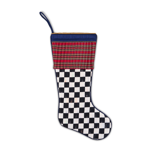 Timeless Tartan Stocking with a black and white checkered body and a red plaid pleated cuff.