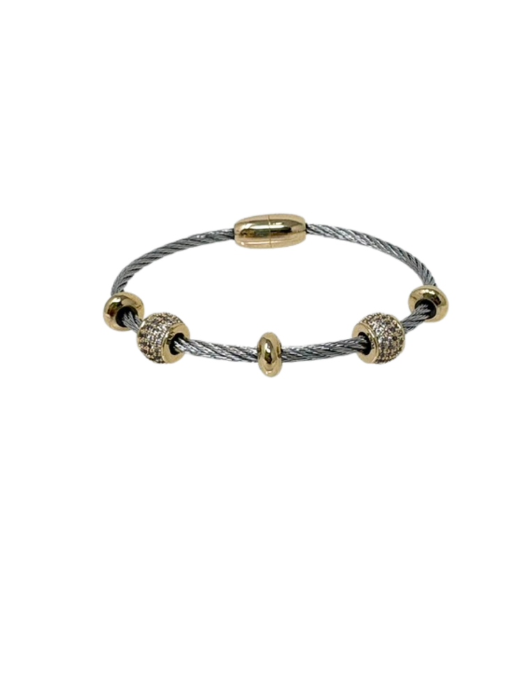 Two tone silver rope bangle with gold beads and cubic zirconia accents.