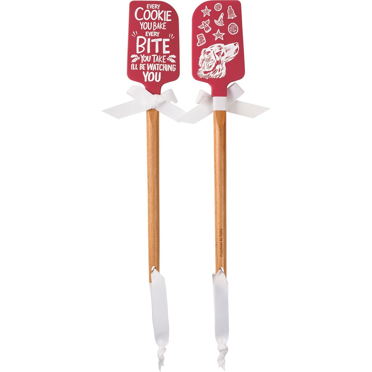 Black silicone spatula with wooden handle featuring red Christmas-themed designs.