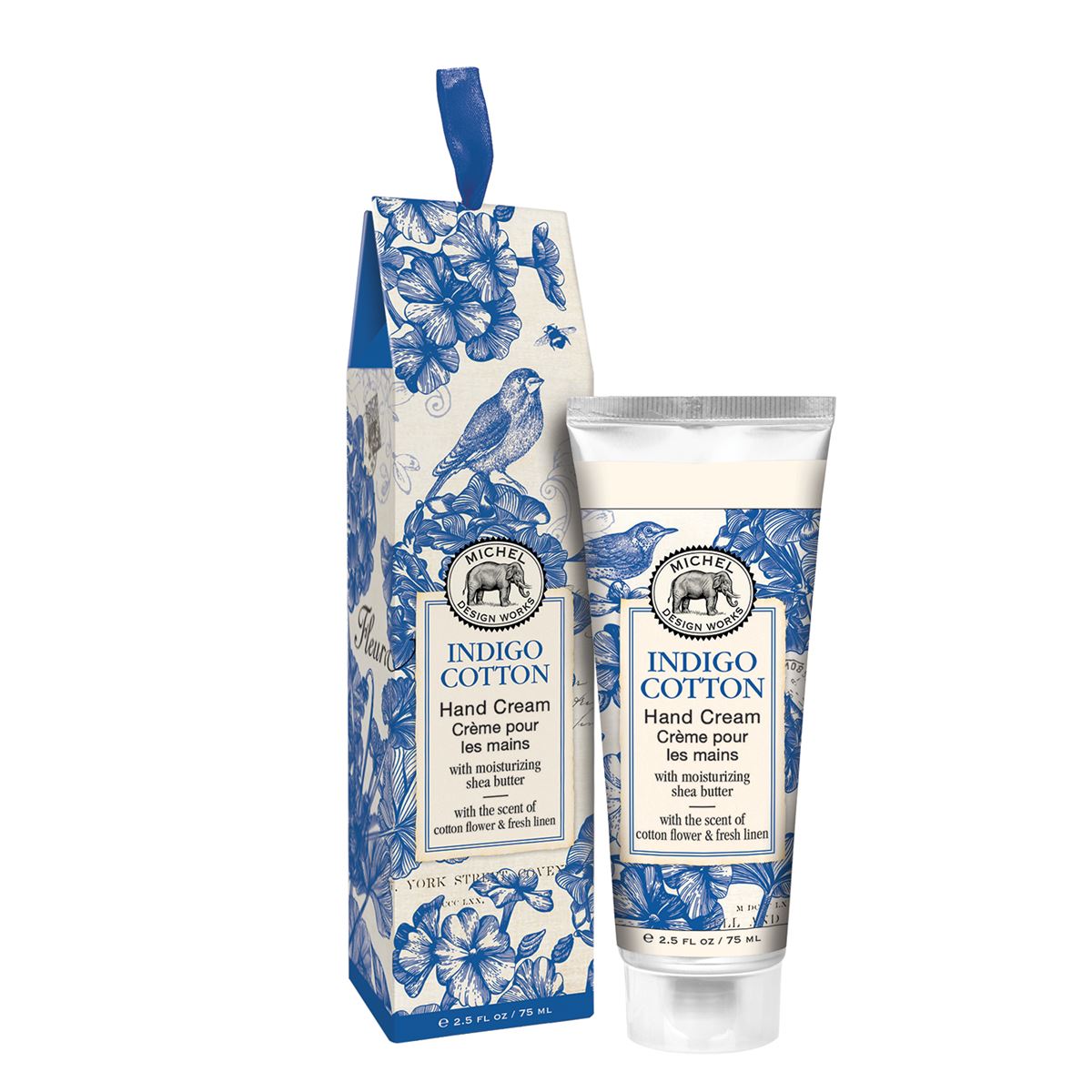 Michel Design Works Indigo Cotton hand cream tube and matching box with blue floral bird pattern.