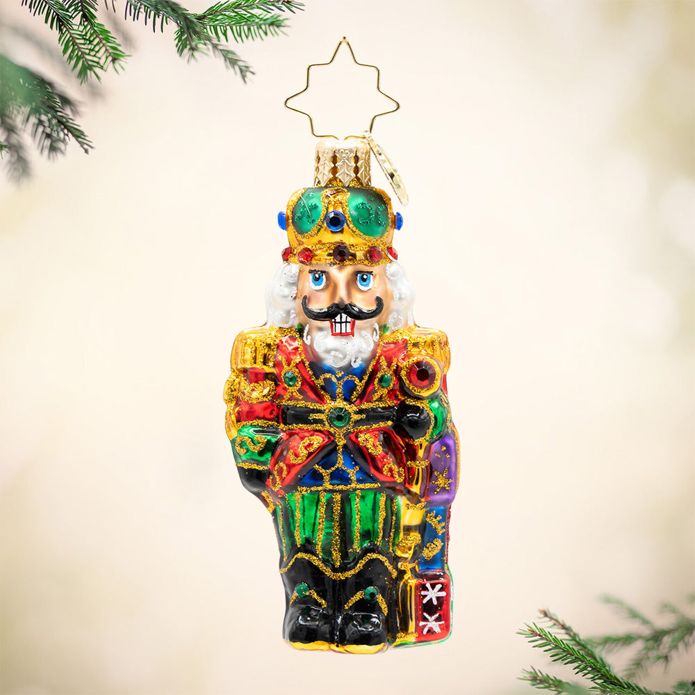 Yuletide Sentinel Gem nutcracker glass ornament with colorful glitter and jewel accents.