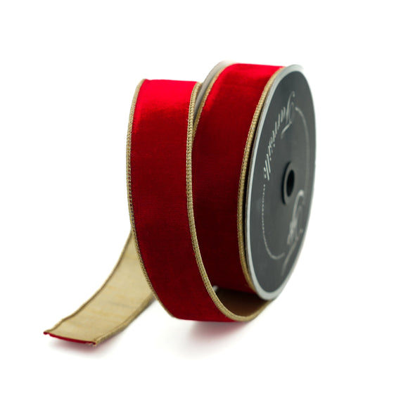 Red velvet ribbon with gold trim on a spool, 1.5 inches wide.