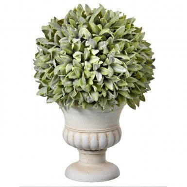 Flocked sage green plastic ball in a white urn planter.