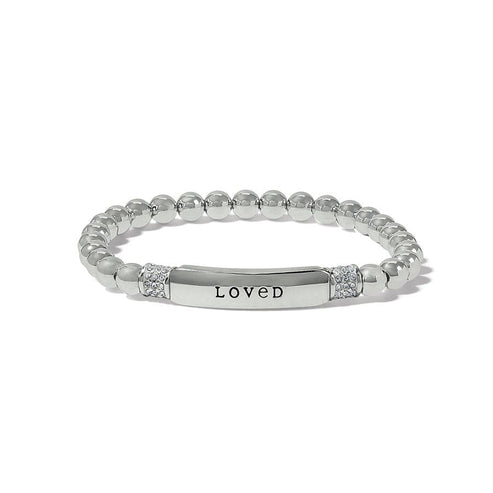 Silver plated Meridian Petite Love stretch bracelet with round beads and a bar engraved with LOVED.