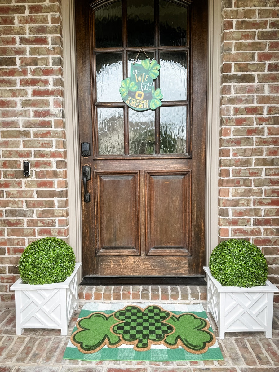Irish door hanger with shamrock motif in green fabric
