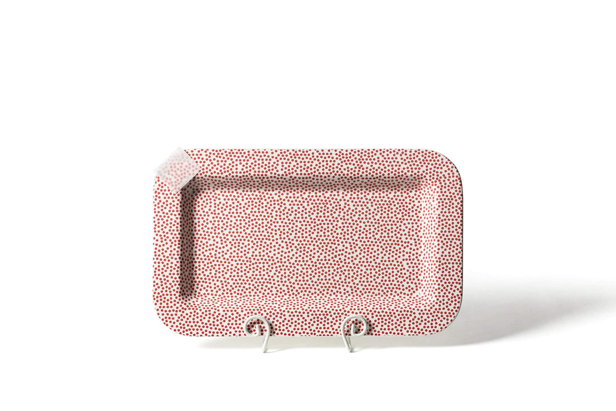 Red ceramic rectangular platter with small dot pattern