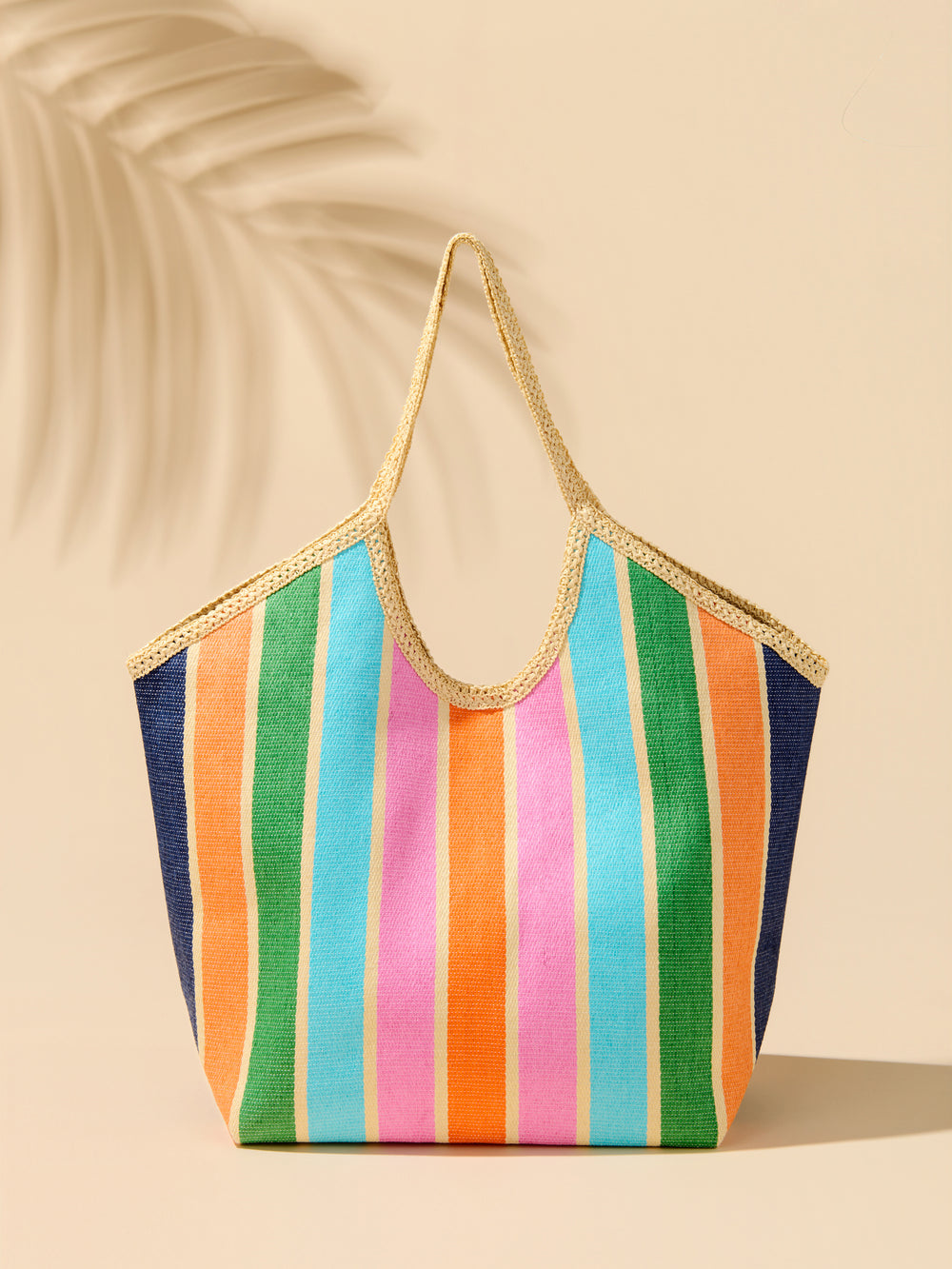 Capri Tote bag in woven paper straw with double shoulder straps.