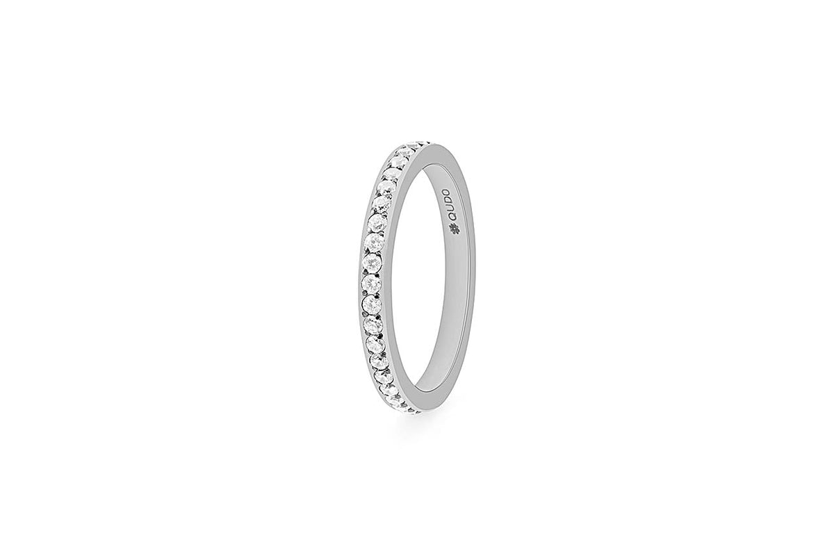 Small eternity ring with a continuous band of spacer stones in silver metal.