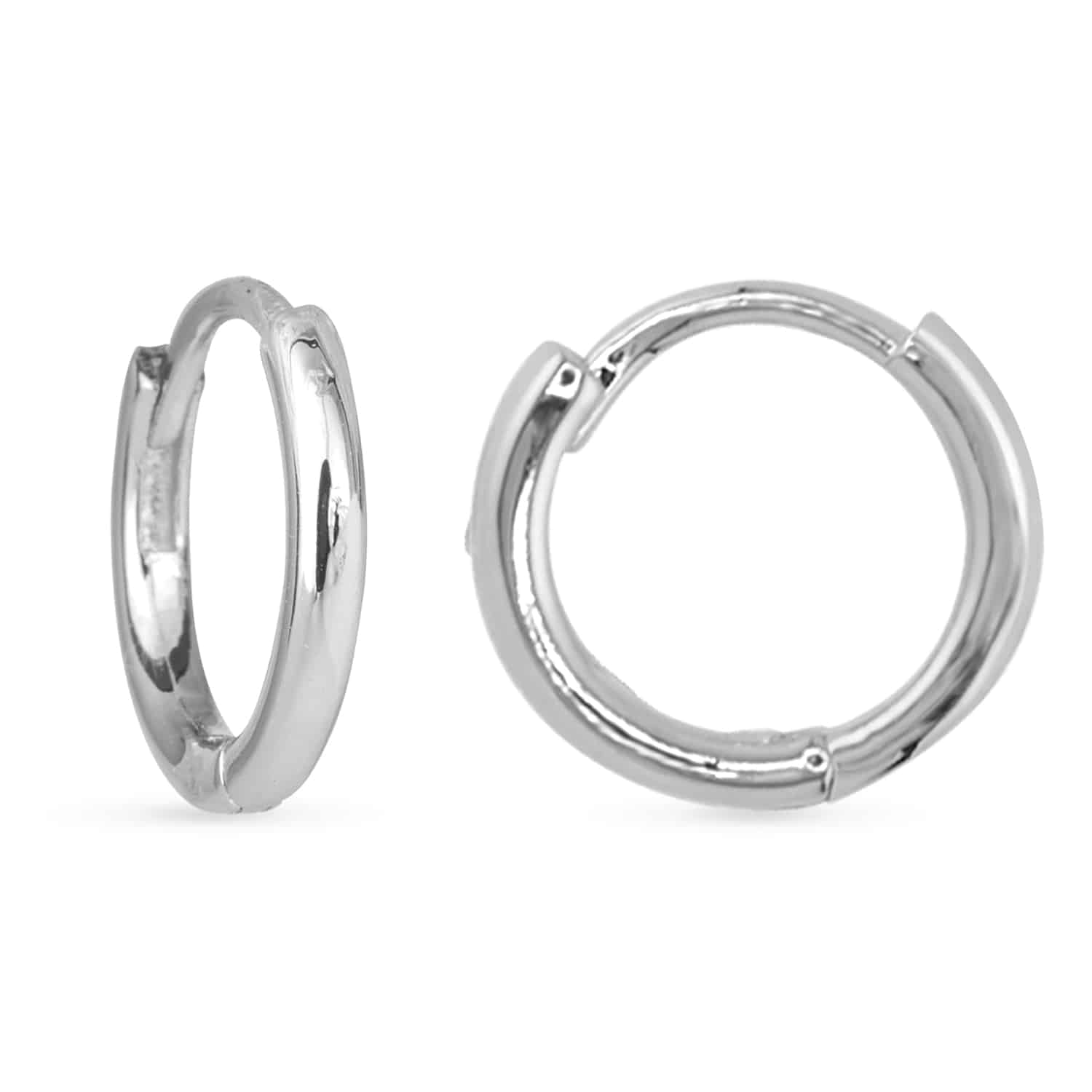 A pair of small, polished silver-toned hoop earrings with a hinged closure.