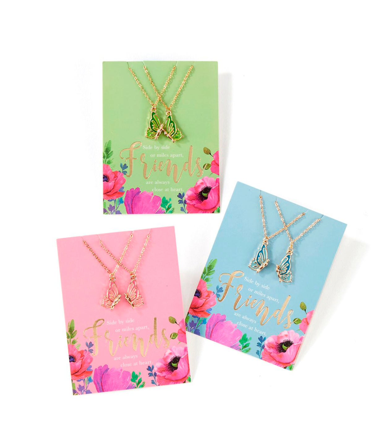 Three sets of carded butterfly necklaces in green, pink, and blue with 'Friends' message.