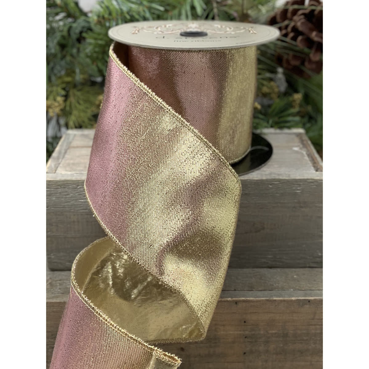 4-inch wide gold-pink metallic illusionist ribbon with a shimmering gradient finish.